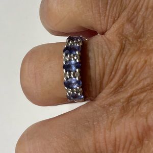 Sterling silver band with blue topaz and CZ stones